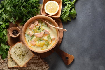 Creamy fish soup with salmon, potatoes, onions , carrots, dill and celery . Kalakeitto-traditional...