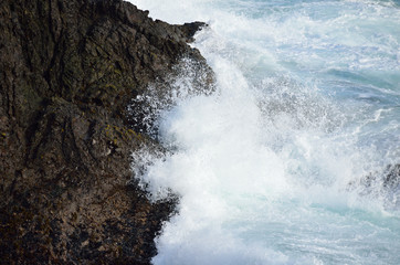 Waves crashing against rocks