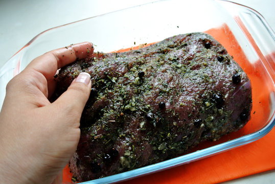 Beef And Beef Meat In A Glass Plate. Raw Roast Beef In Spices. Cooking Meat Marinating In Spices And Herbs