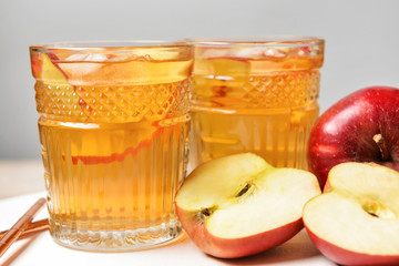 Glasses of tasty cold ice tea on table
