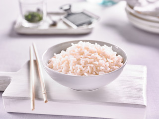 rice on a plate in the kitchen background