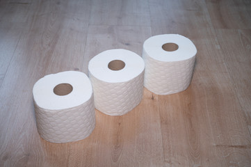 Still life with several rolls of toilet paper