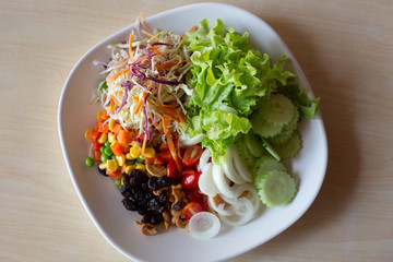 Vegetable salad in a bowl on the table  Cuisine home top view,