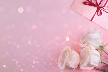 tree pink roses and pink gift box on pink shine background