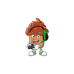 A cartoon design of chocolate cupcake talented gamer play with headphone and controller