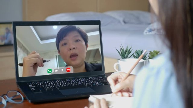 4K. work from home. boss making video conference to order work with employee via laptop computer during home isolation to avoid spreading illness transmission of COVID-19 Coronavirus outbreak.