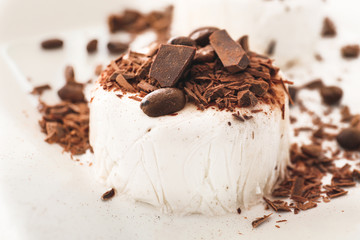 Tasty panna cotta on plate, closeup