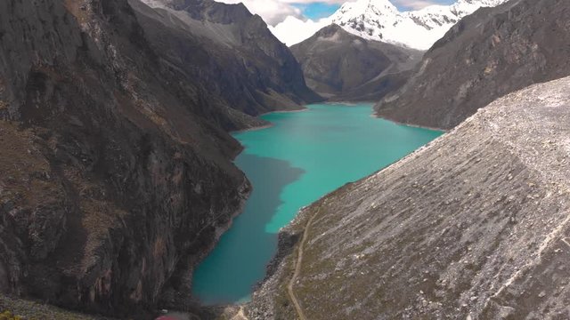 Paron lake, peruvian andes, revel tilt, aerial shot, lake and view point, panoramic shot.