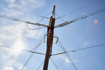 Electric power lines and wires with blue sky. Support of power lines in a nice day