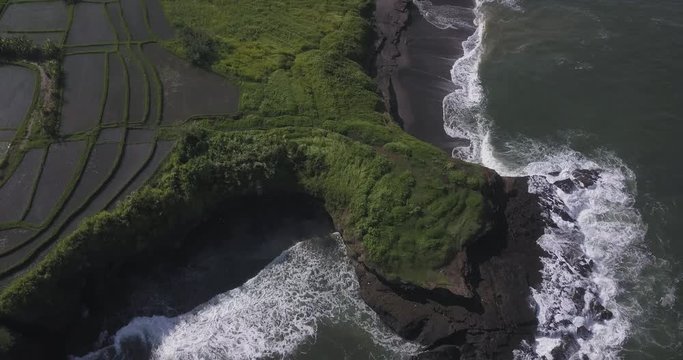 Aerial view of rice fields and Kedungu beach, Bali, Indonesia