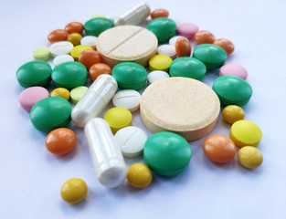 Colourful pills set, medicine background