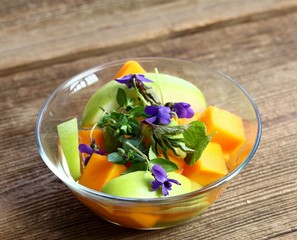 Fermented salad from butternut and green apple with dressing. Vegetarian fermented salad decorated...