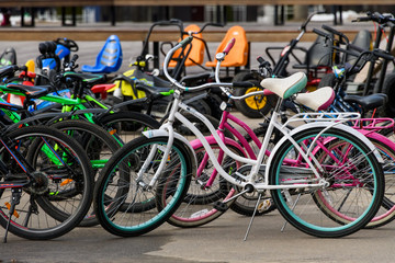 Fototapeta na wymiar Bicycles are available at the Bicycle rental Parking lot.