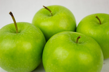 Green apples with white background