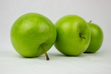 Green apples with white background
