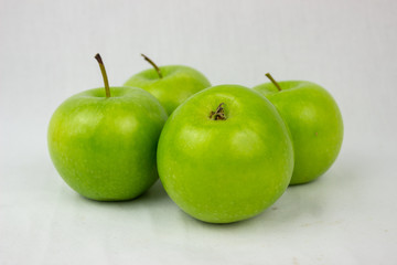 Green apples with white background