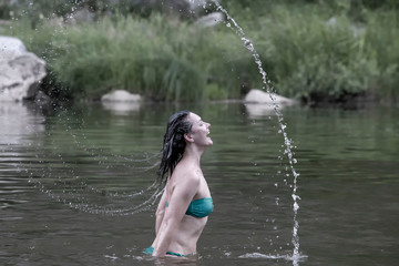 Girl throws water head