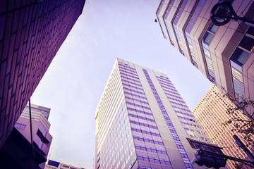 Fototapeta na wymiar Looking up the Shinjuku High-rised Buildings in Vintage Filter