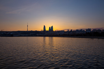 Sunset of Baku, Azerbaijan . Fire towers in the night