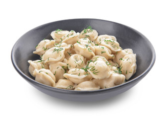 Bowl with tasty dumplings on white background