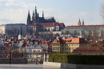 Prague Castle behind a forged fence