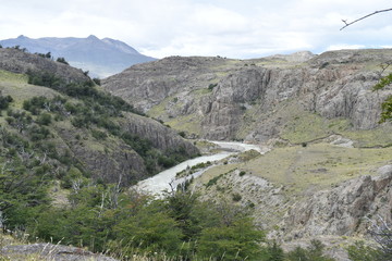 Hiking Trail to the Laguna de Los Tres in National Park in El Chalten, Argentina, Patagonia with mountains and a river in background