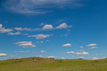 Obraz premium blue sky with Cumulus clouds, field (steppe)