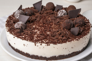 Tasty chocolate cheesecake on plate