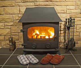 Closeup of multi fuel burner stove fire with hearth