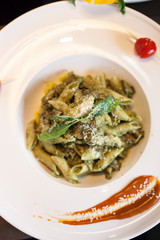A tasty alfredo penne pasta dish
