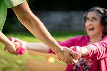 Senior woman doing sport and working out outdoors