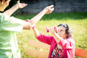 Senior woman doing sport and working out outdoors