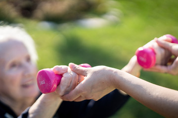Senior woman doing sport and working out outdoors