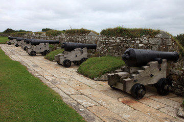 Fototapeta na wymiar Falmouth (England), UK - August 15, 2015: Cannon near Pendennis castle, Falmouth, Cornwall, England, United Kingdom.
