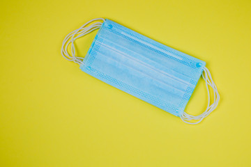 Surgical masks with rubber ear bands.