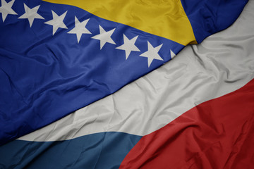 waving colorful flag of czech republic and national flag of bosnia and herzegovina.