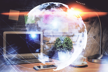 Double exposure of business theme icons and work space with computer background. Concept of success.