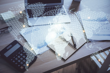 Double exposure of business theme icons and work space with computer background. Concept of success.