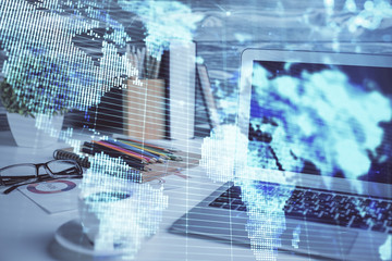 Double exposure of business theme icons and work space with computer background. Concept of success.