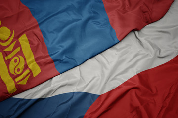 waving colorful flag of czech republic and national flag of mongolia.