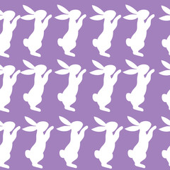 Vector illustration with silhouette of a white easter bunny on a purple background seamless pattern. Happy Easter concept