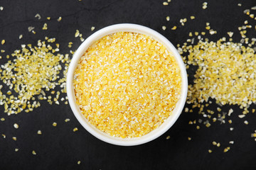 A ceramnic bowl with dry mais seeds