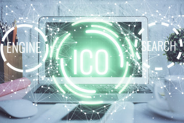 Multi exposure of blockchain and crypto economy theme hologram and table with computer background....