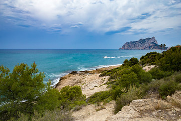 Panoramic view of the Ifach Rock Natural Park or Penon de Ifach in the city of Calpe in Spain. View from Moraira Costa Blanca.