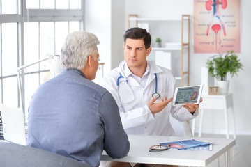 Fototapeta premium Senior man visiting urologist in clinic