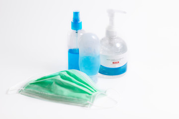 Coronavirus corona virus prevention travel surgical masks and hand sanitizer gel for hand hygiene spread protection. isolate background