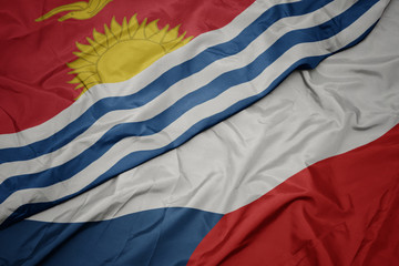 waving colorful flag of czech republic and national flag of Kiribati .