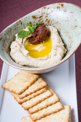 Hummus bowl with crackers