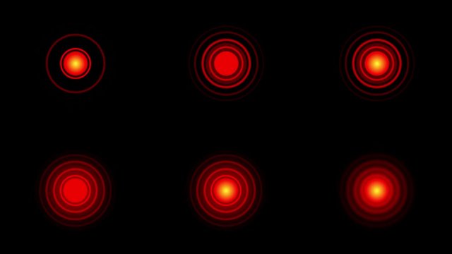 Pain red circles or localization mark flashes on a black background.