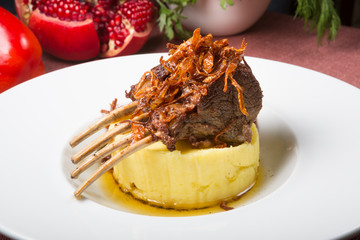 Spicy lamb rack served with garnish